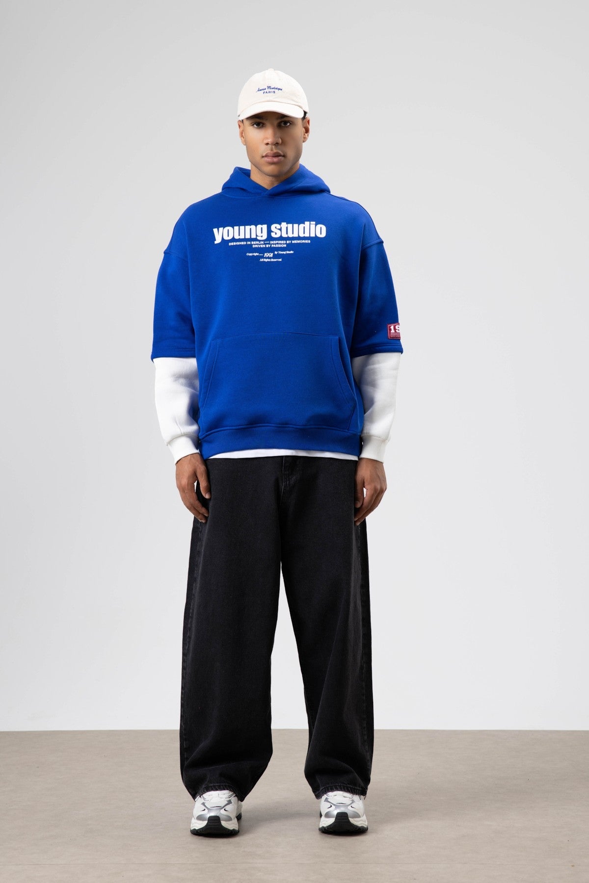 Oversized Printed Hooded Sweatshirt in Saks