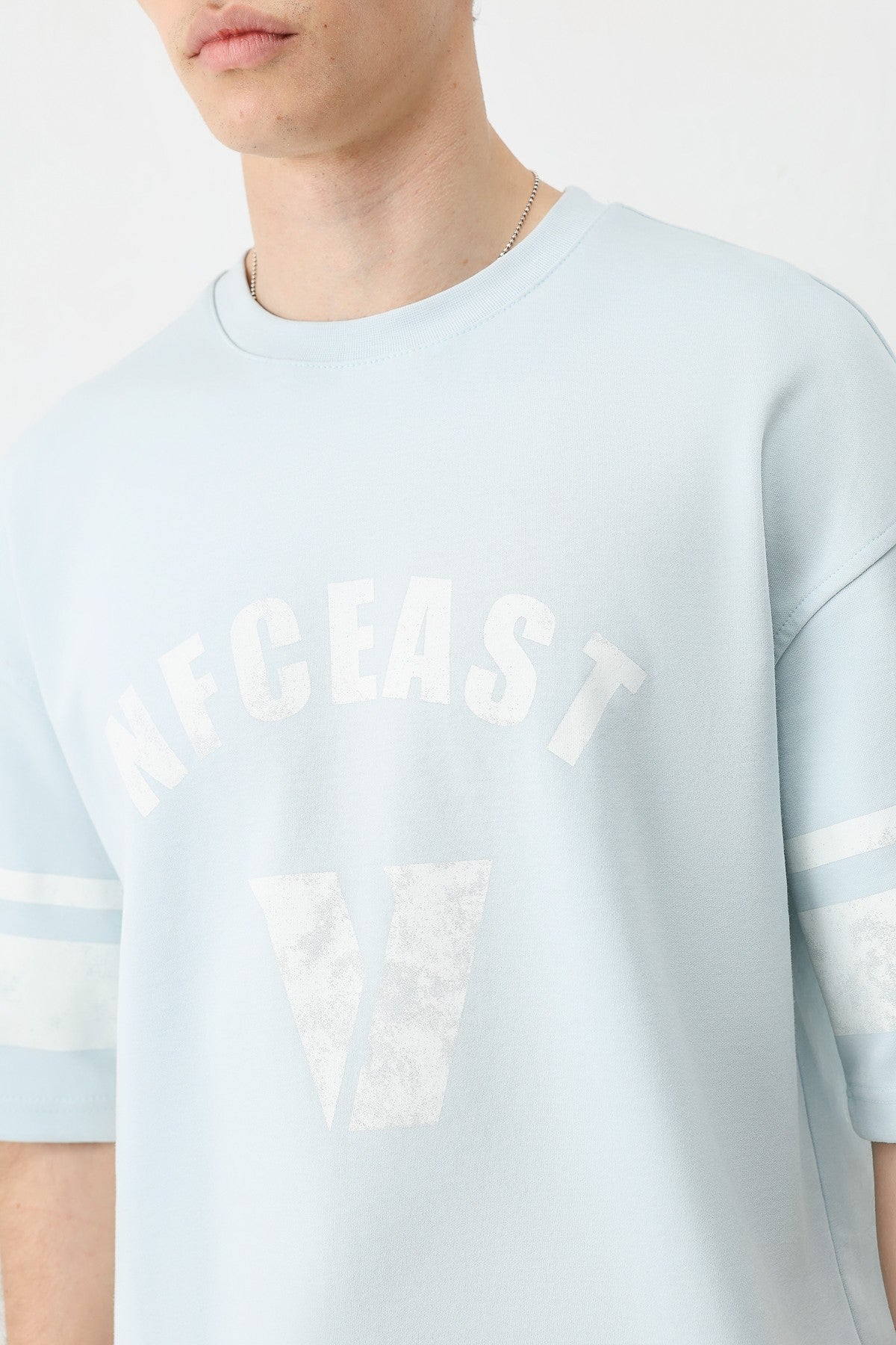 Oversized T-Shirt with V-Print and Sleeve Details