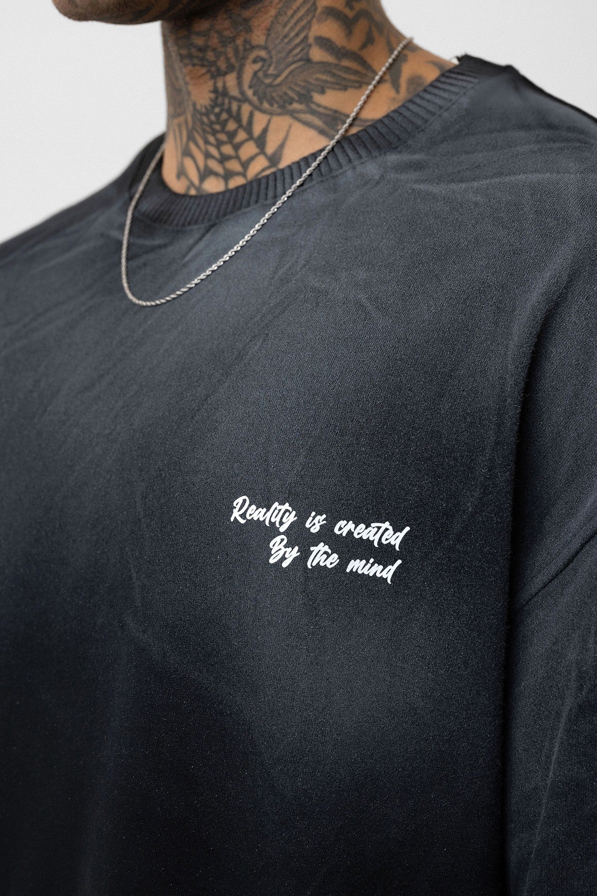Oversized T-Shirt with Washed-Out Print and Detailed Design