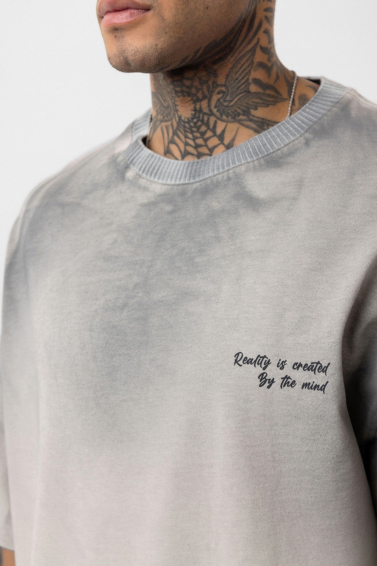 Oversized T-Shirt with Washed-Out Print and Detailed Design